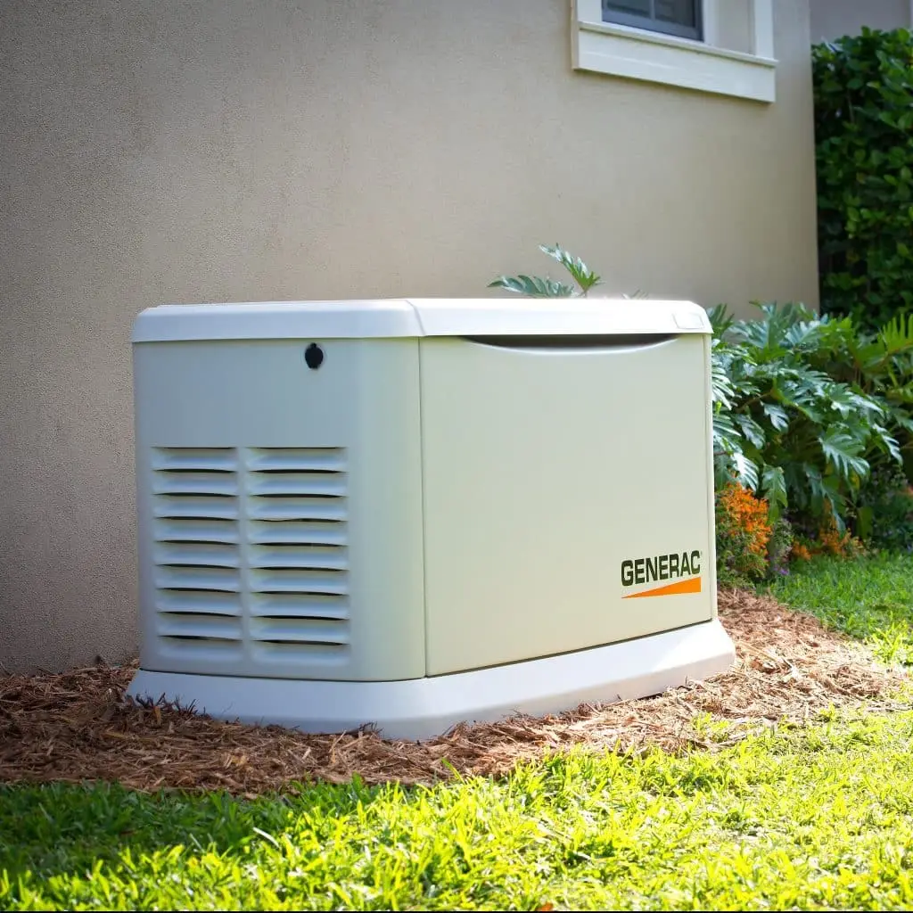 Generac generator installed next to a home
